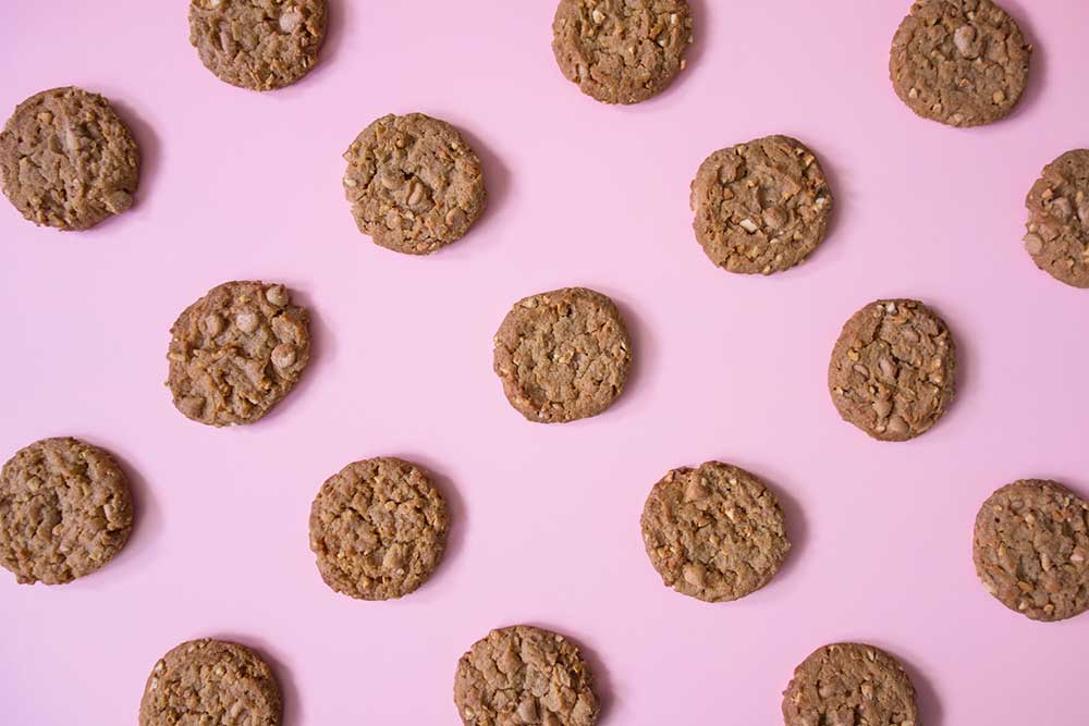 Tray of cookies on pink background header image